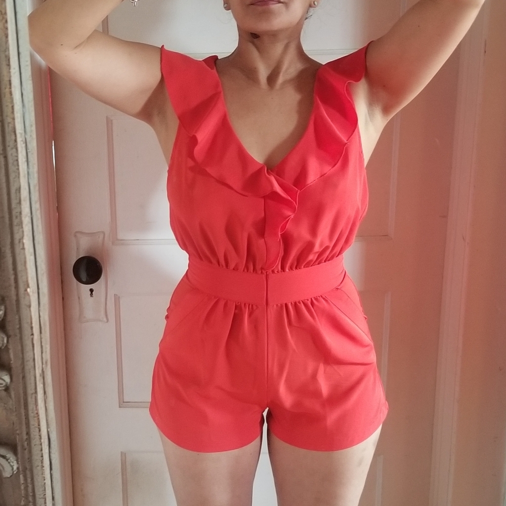 Red romper with ruffles from Urban Outfitters